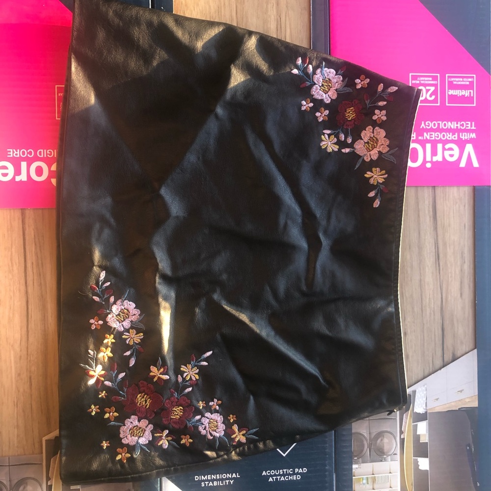 Black leather mini skirt